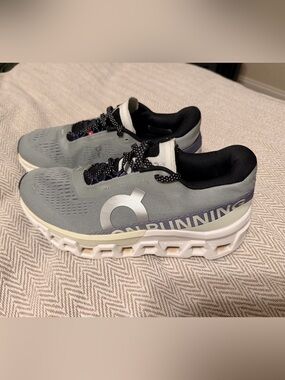 On Running Gray and Black Women’s Athletic Running Shoes